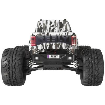 Remote-controlled car with large, robust tyres and black-and-white pattern, photographed from behind, ready for off-road adventure.