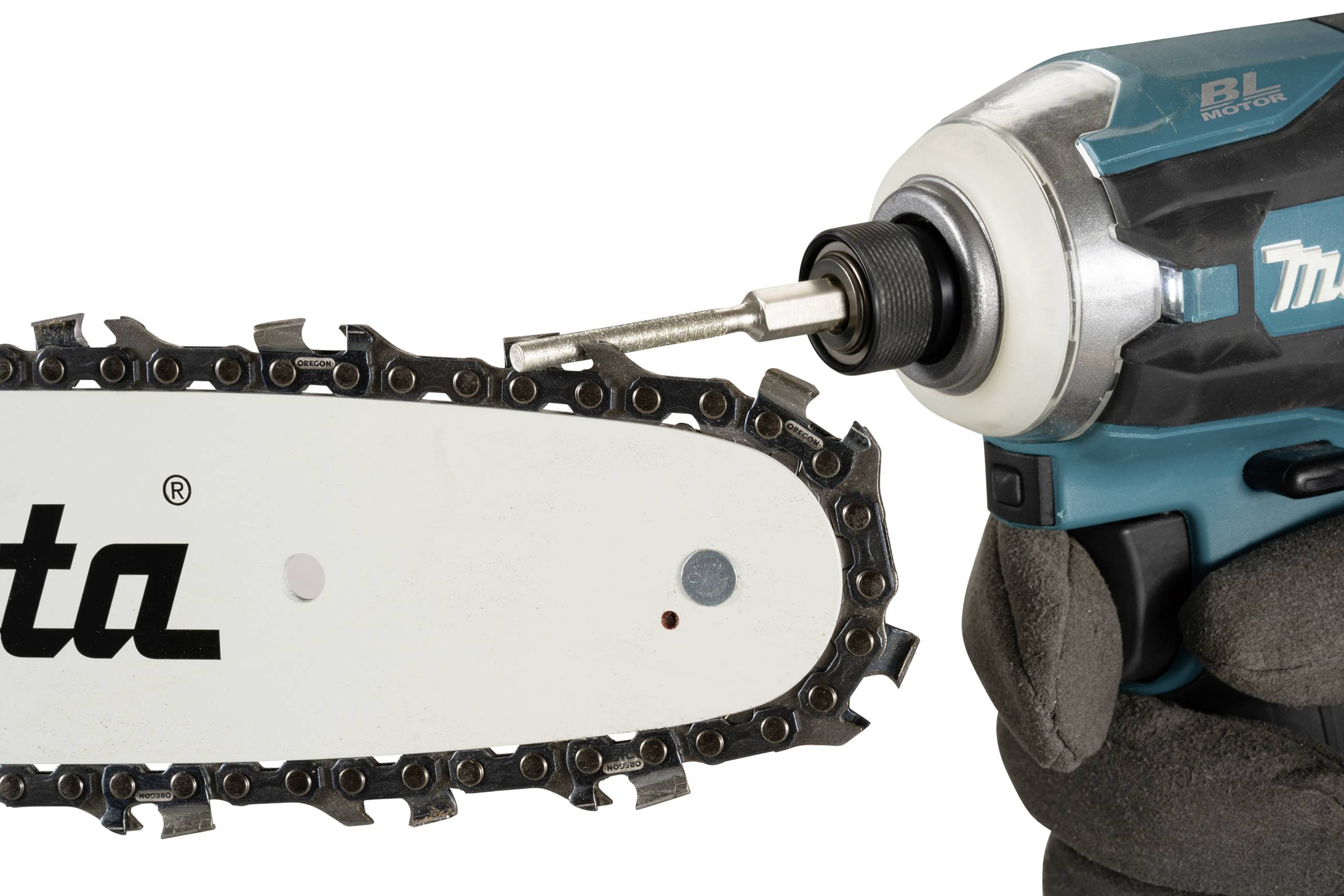 'Drill with chain oil sharpening attachment processes chainsaw chain.'