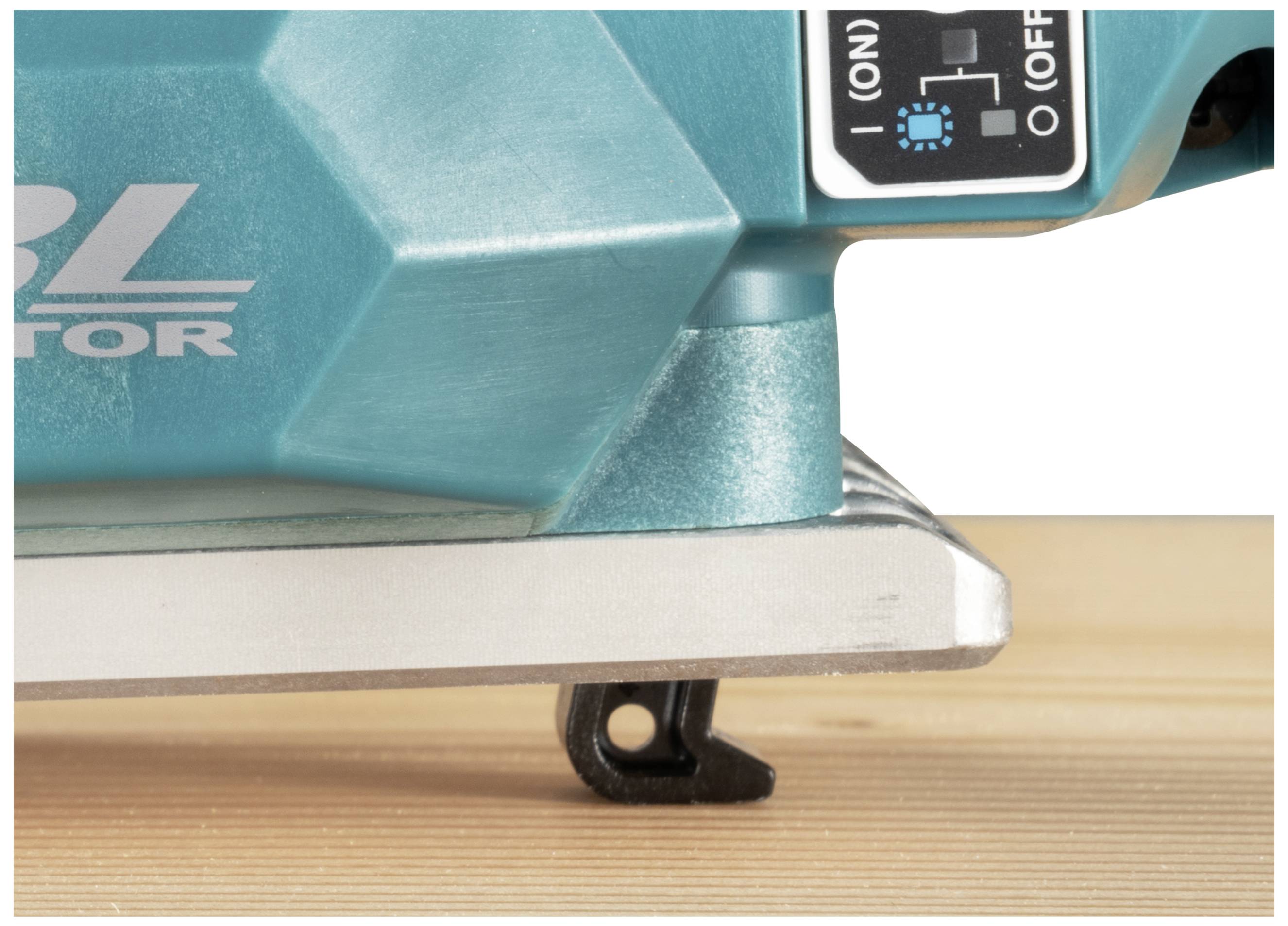 A close-up of an electric sander on a wooden board, with the switch set to 'Off'.