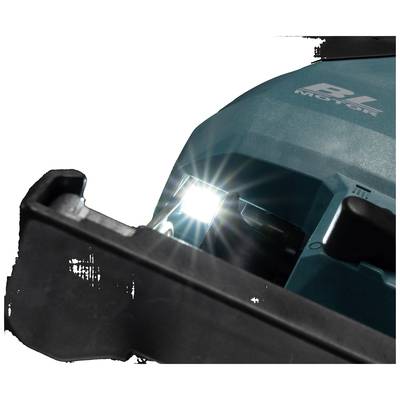 A close-up of a blue electric tool with an illuminated LED light, casting light on part of the tool.