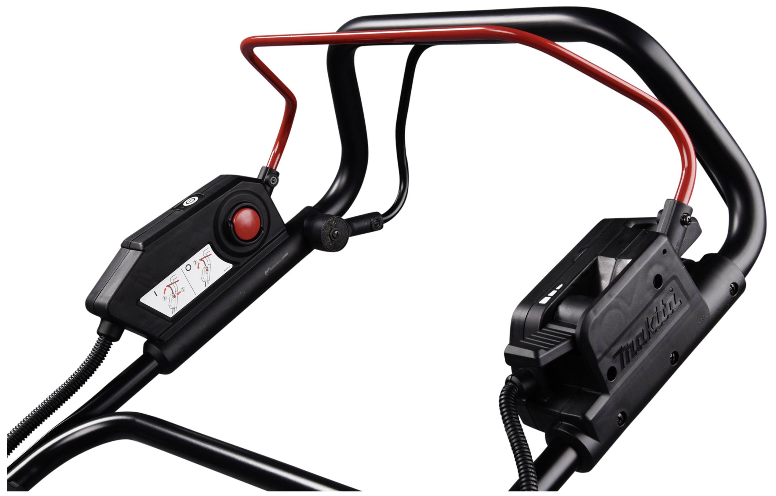 Two black handles with red switches and a monitor, likely control elements for a machine or device.