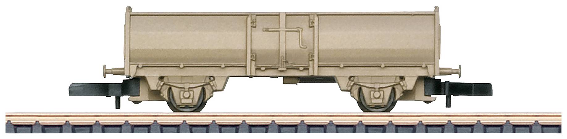 A brown goods wagon is standing on a railway track. The wagon has a cylindrical shape and two wheel sets.