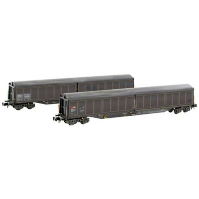 Two dark brown model railway carriages with detailed surface structures and wheels, suitable for model railway layouts.