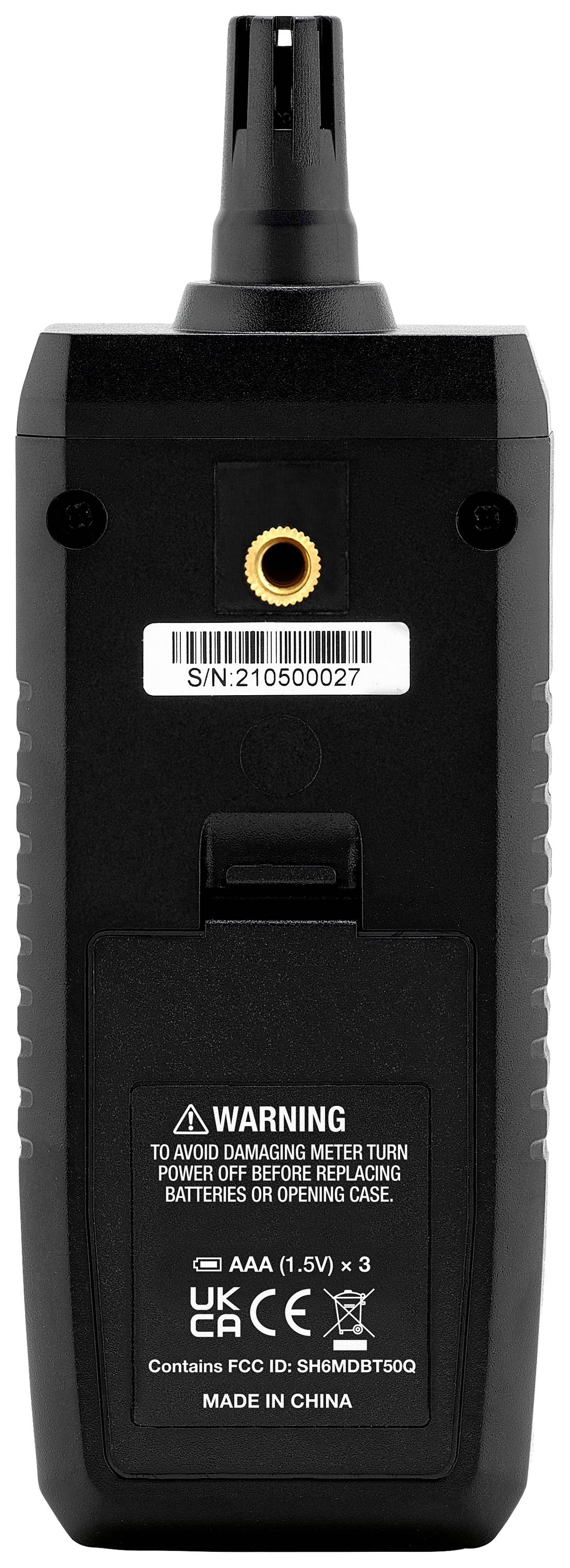 A black device with a warning on the back: 'Insert batteries to prevent damage'. Serial number visible at the top.