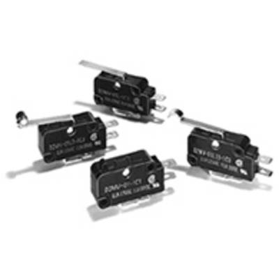 Four black micro switches with levers, lying on a white surface. The switches are similarly arranged and feature silver contacts.