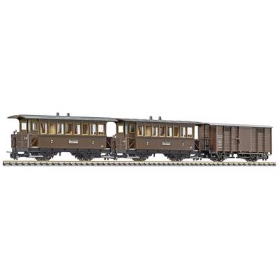 Brown model train with two passenger carriages and a goods wagon, positioned on a model railway track.