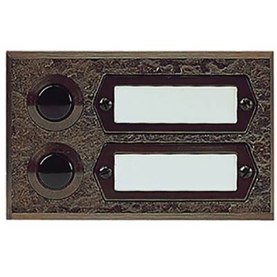 Two doorbell buttons with rectangular name plates on a metallic surface.
