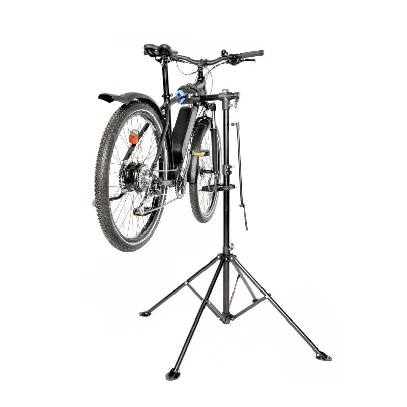 A bicycle on a repair stand. The rear wheel is raised, and the stand is mounted on a three-legged frame.