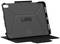 Black protective case for a tablet, with a structured design and the inscription 'UAG' on the back, is standing open on a table.
