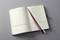 Open notebook planner with multiple sections, columns for tasks and space for notes. Three bookmark ribbons in different colours.