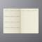 An open planner shows a birthday list by months on the left side, and an empty contact list on the right side with symbols for email, telephone, and address.