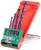 Four woodworking drill bits in various sizes in a red storage box with a green holder; suitable for precise drilling in wood.