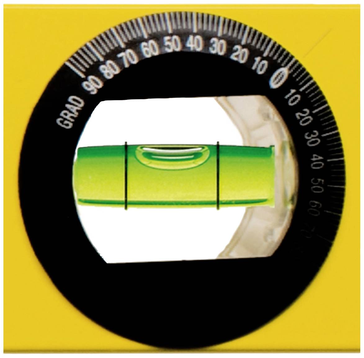 A spirit level with a green liquid bubble in the centre indicates that the surface being measured is level.