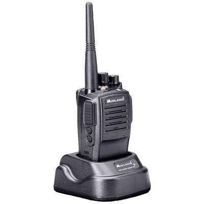 A black two-way radio with a long antenna sits in a charging station. On the top are buttons for adjusting frequencies.
