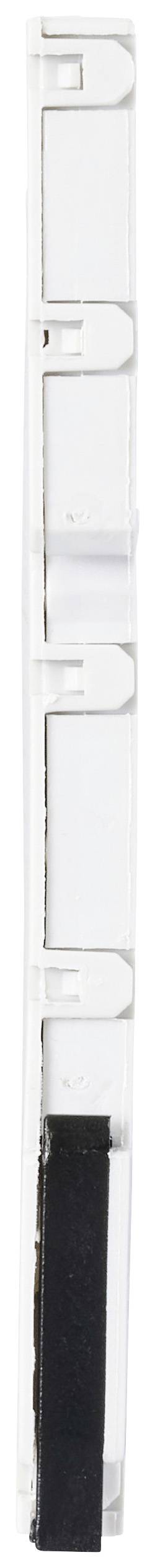 A transparent plastic strip with several hooks and a black adhesive surface underneath, likely for securing purposes.