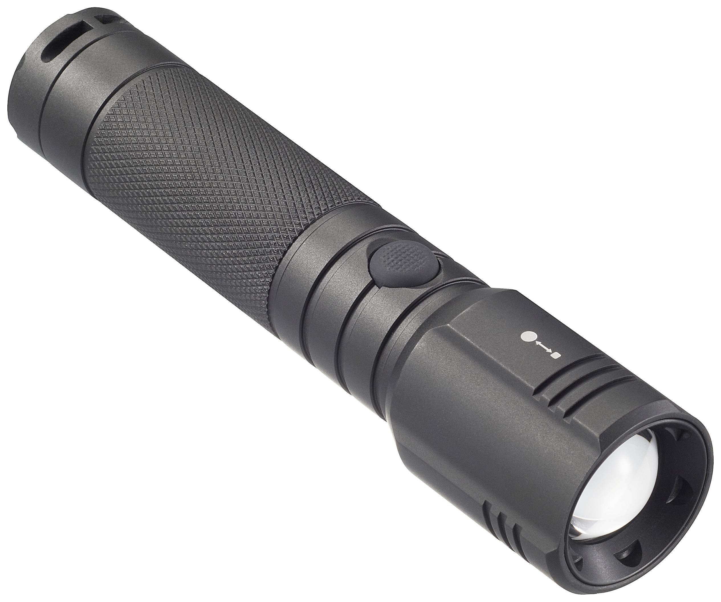 Black torch with knurled handle and lens head, lying at an angle on a white surface.