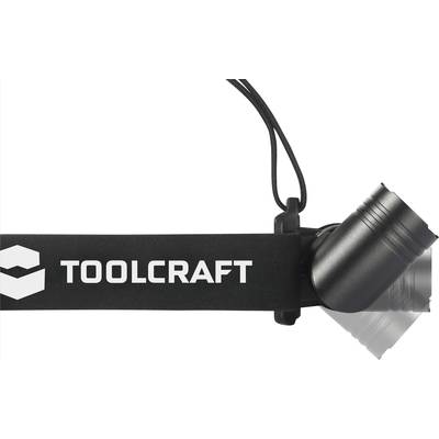 A black TOOLCRAFT LED head torch with adjustable strap and a light beam on the right, ideal for outdoor use.