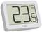 Digital thermometer, display: 23.5 degrees Celsius. Rectangular white display with black digits.
