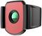 A red and black motion sensor with a central green lens.