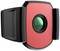 A red and black, rectangular device with a central green, circular sensor. Possibly a camera or sensor device.