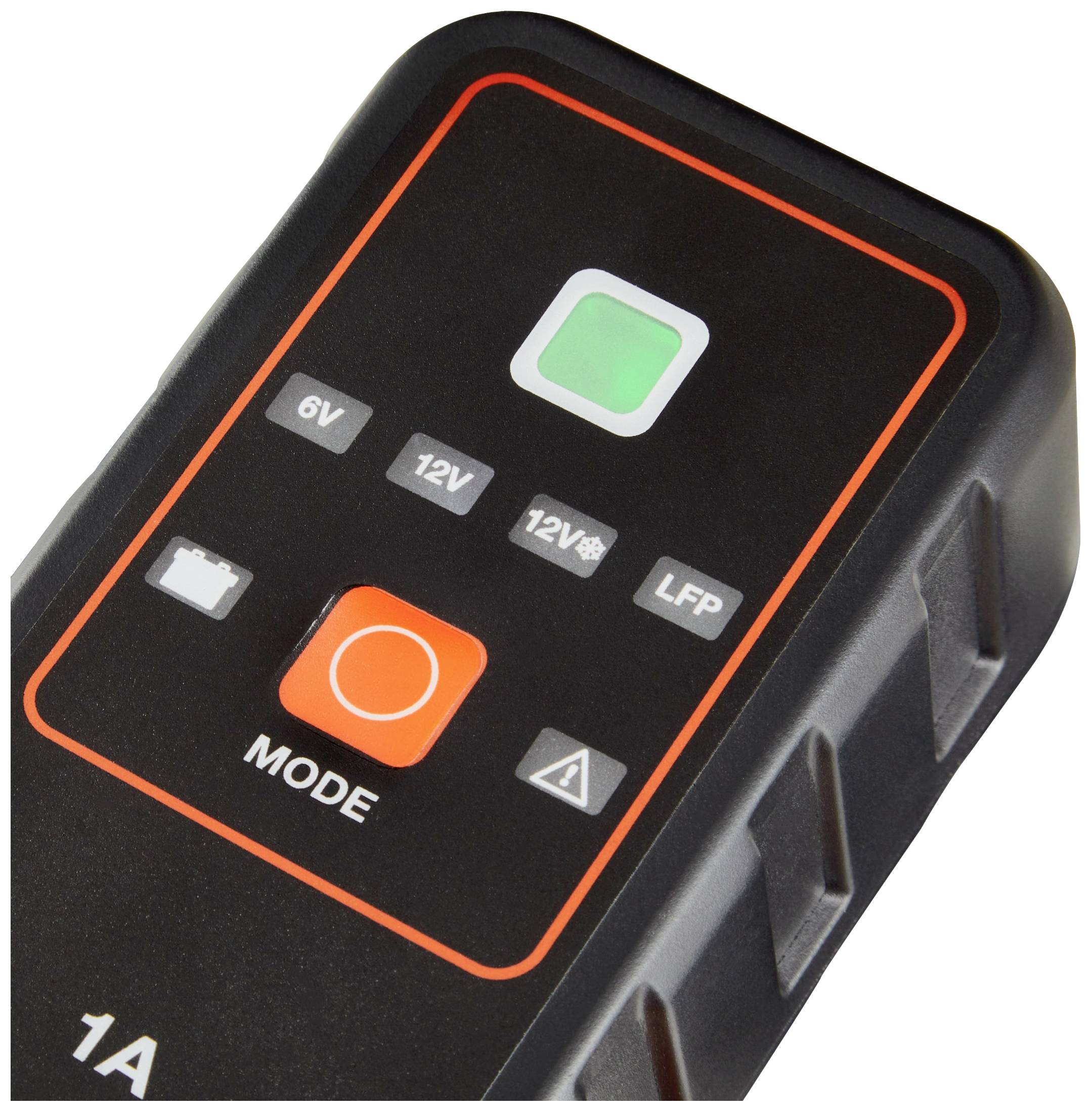 'Close-up of a battery charger with 6V, 12V, 12V AGM and LFP modes. A green and a red light along with mode and warning symbols are visible.'