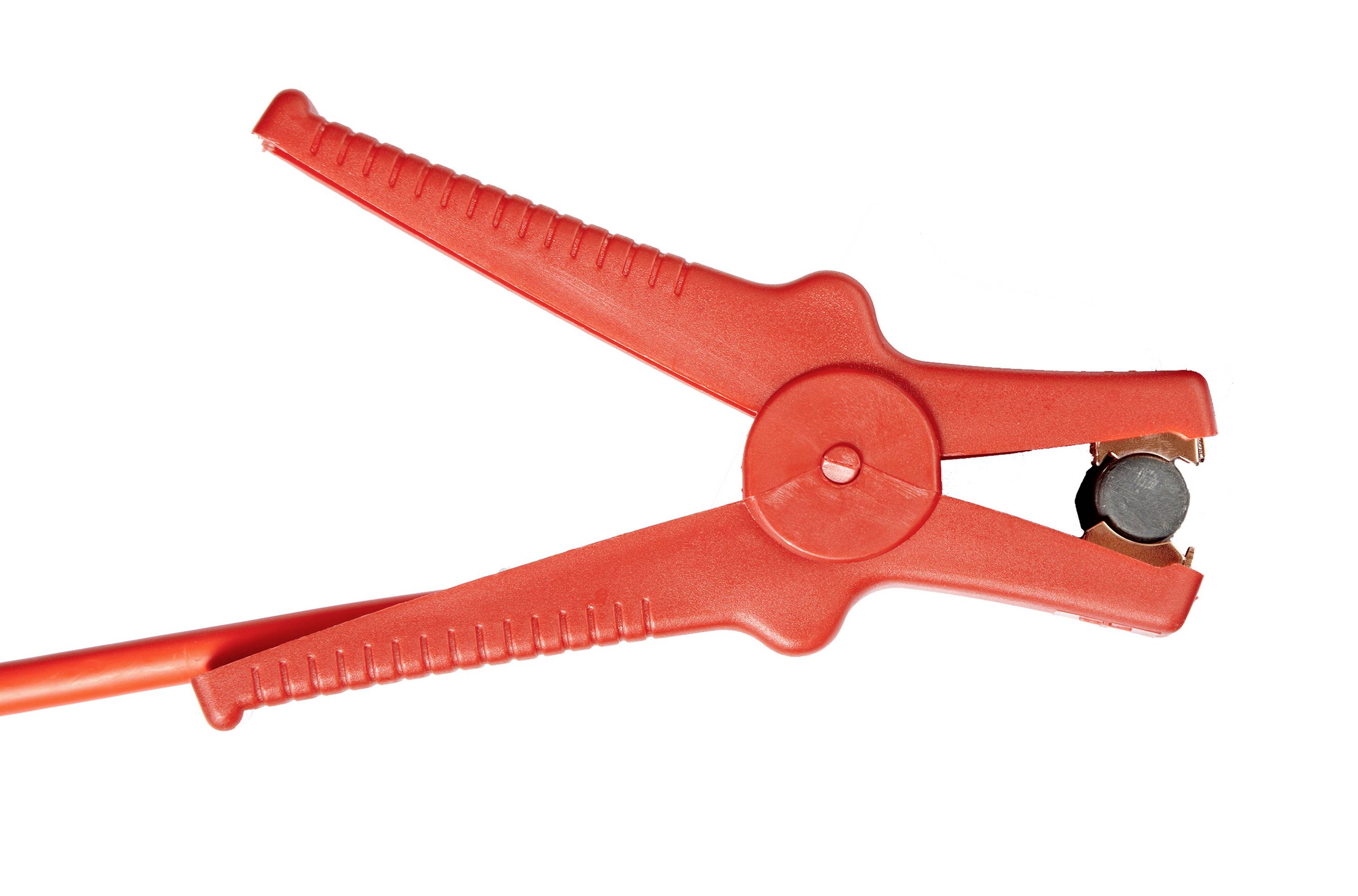 Red jump leads, likely used for jump-starting car batteries, isolated on a white background.