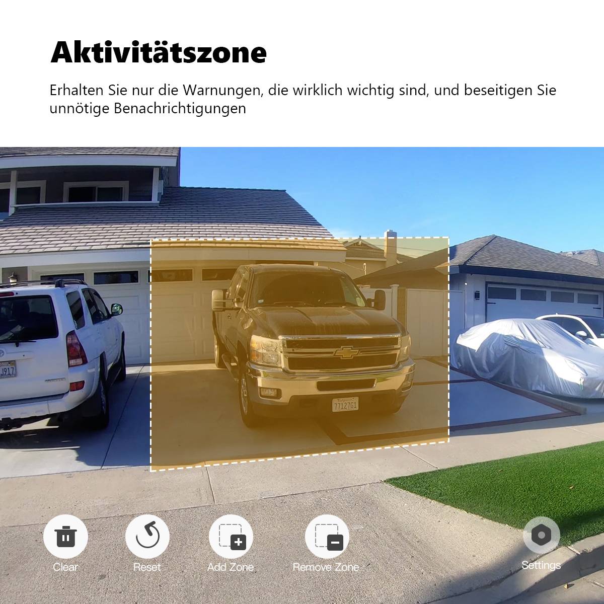 'A marked lorry in an area on a driveway in front of a house to receive notifications about activities.'