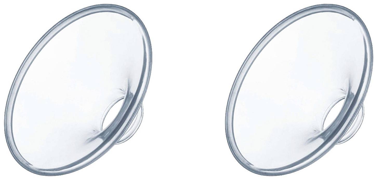 Two transparent plastic breast covers, comparable in shape and size, arranged on a white background.