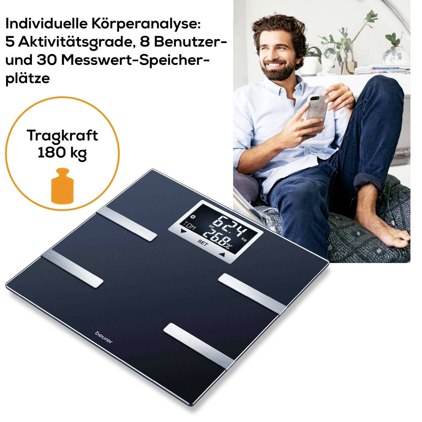 A person is sitting smiling and holding a smartphone. Next to them is a digital scale displaying '62.4 kg'. Text: 'Weight Capacity 180 kg'.