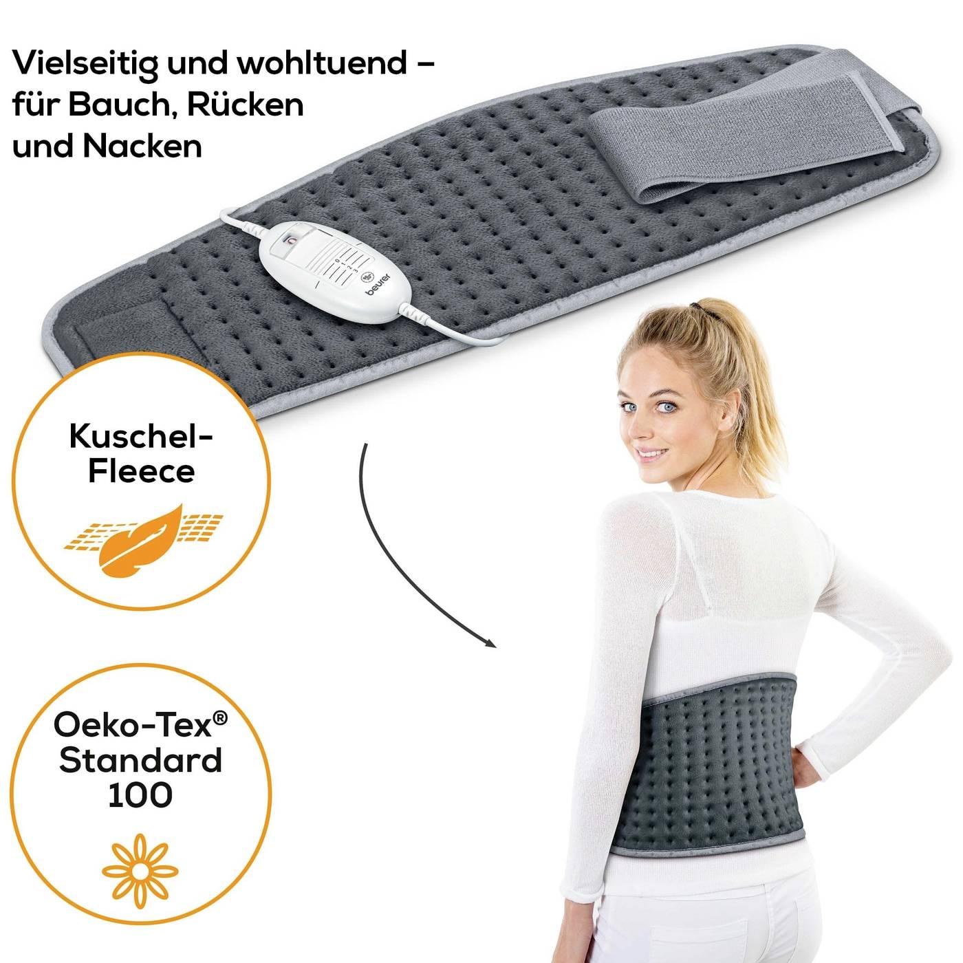 Woman with a grey heat pad around her back. Text: 'Versatile for stomach, back, neck', 'Snuggle fleece', 'Oeko-Tex Standard 100'.