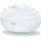 A round, white humidifier with a ribbed surface and a central outlet. The brand name 'beurer' is displayed on the front.