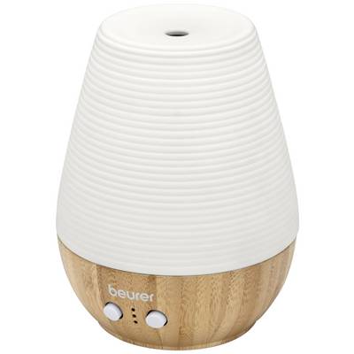 An aroma diffuser with a white, ribbed body and wooden base. Two buttons and a company logo 'beurer' are visible at the base.
