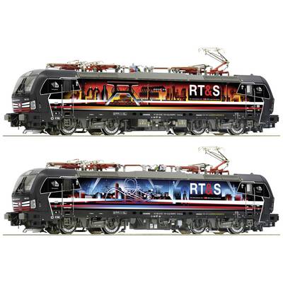 Two locomotives with colourful city and landscape motifs on them. Both carry the inscription 'RT&S' in large white letters.