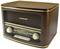 A vintage wooden radio with golden embellishments displays the time as 10:53 and is playing 'Classical Music'.