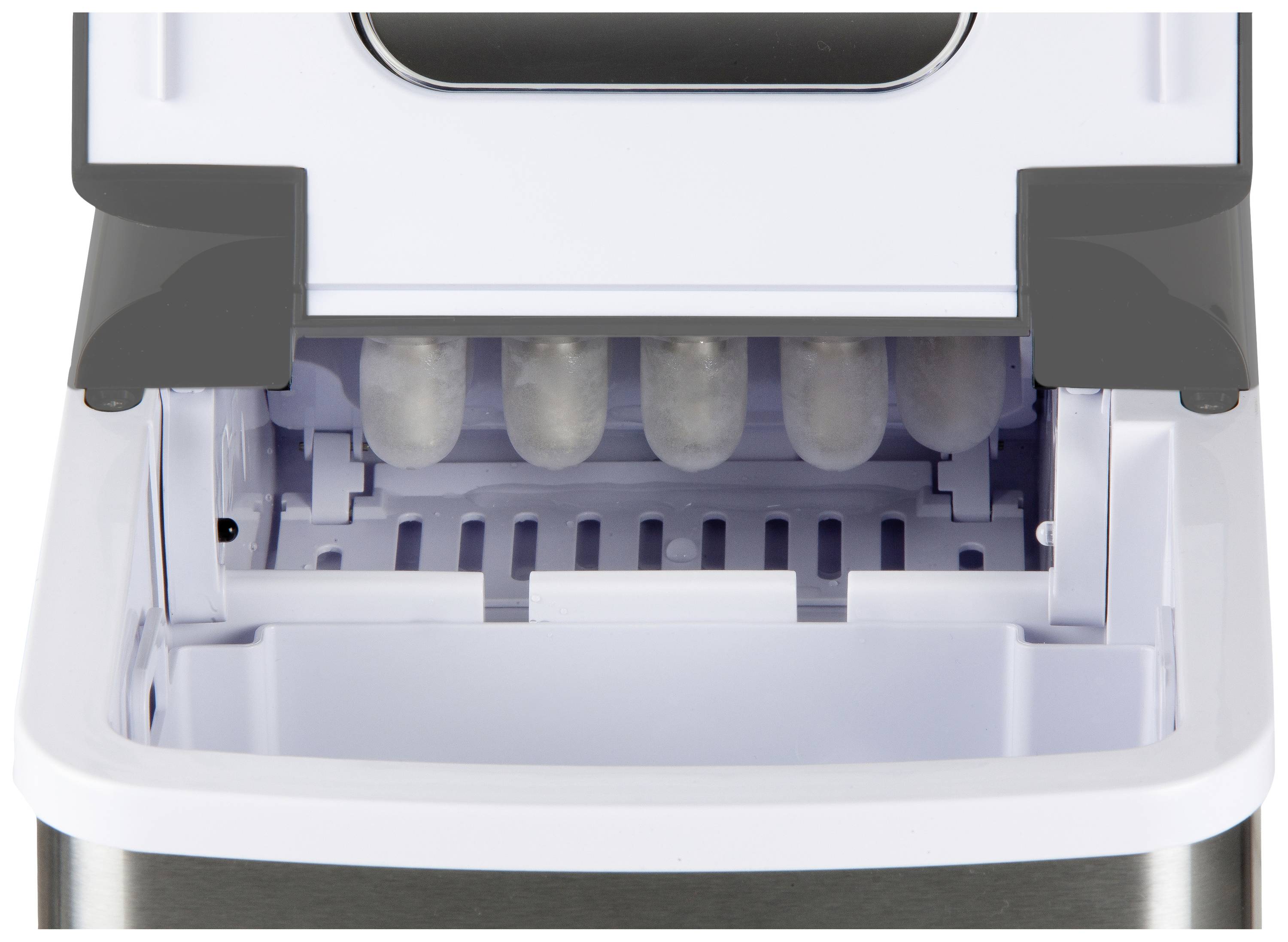 Ice cube machine with open lid showing ice cubes in the production chamber.