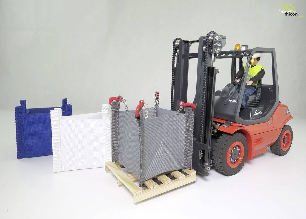 A red forklift is lifting a grey container on a pallet. Two additional containers are standing in the background.