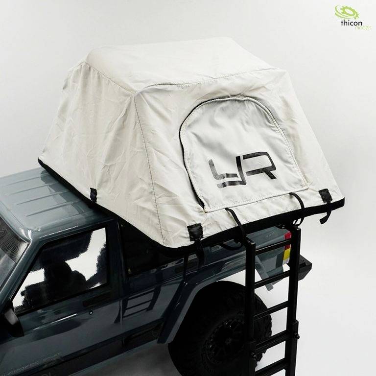 A rooftop tent is installed on an off-road vehicle. A ladder is attached for climbing up. The 'thicon' logo is visible in the background.