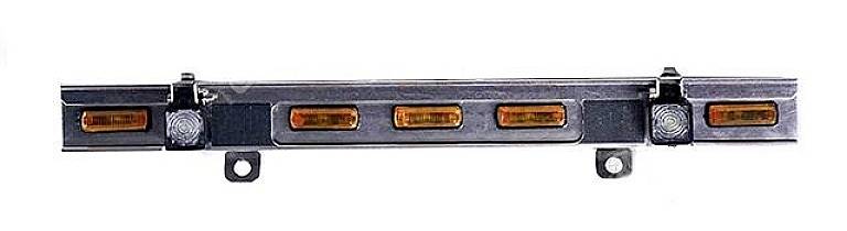 A metallic beam with four evenly distributed rectangular, amber-coloured lights, possibly for illumination purposes.