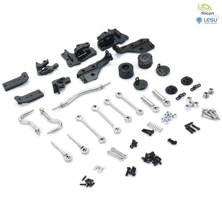 Several small metal and plastic components arranged on a white background, including rods, screws, nuts and brackets.