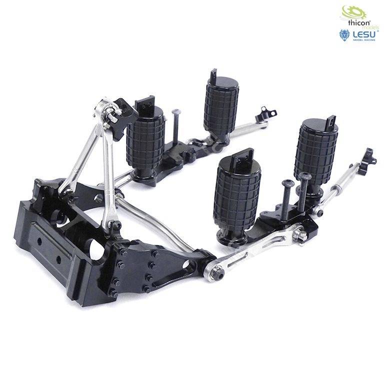 A model of a suspension system in black and silver metal. It shows springs and mounting frames, particularly well-suited for model making.