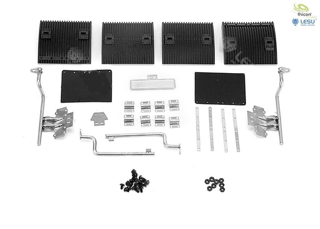 'Set of replacement parts for a model truck, comprising four black grilles, metal rods, screws and mounting brackets.'