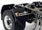 A model vehicle chassis with detailed structures and a large tyre. Focus on suspension and wheel construction.