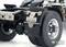 Rear wheel and axle of a lorry model, detailed view of mechanical components and tyre structure.