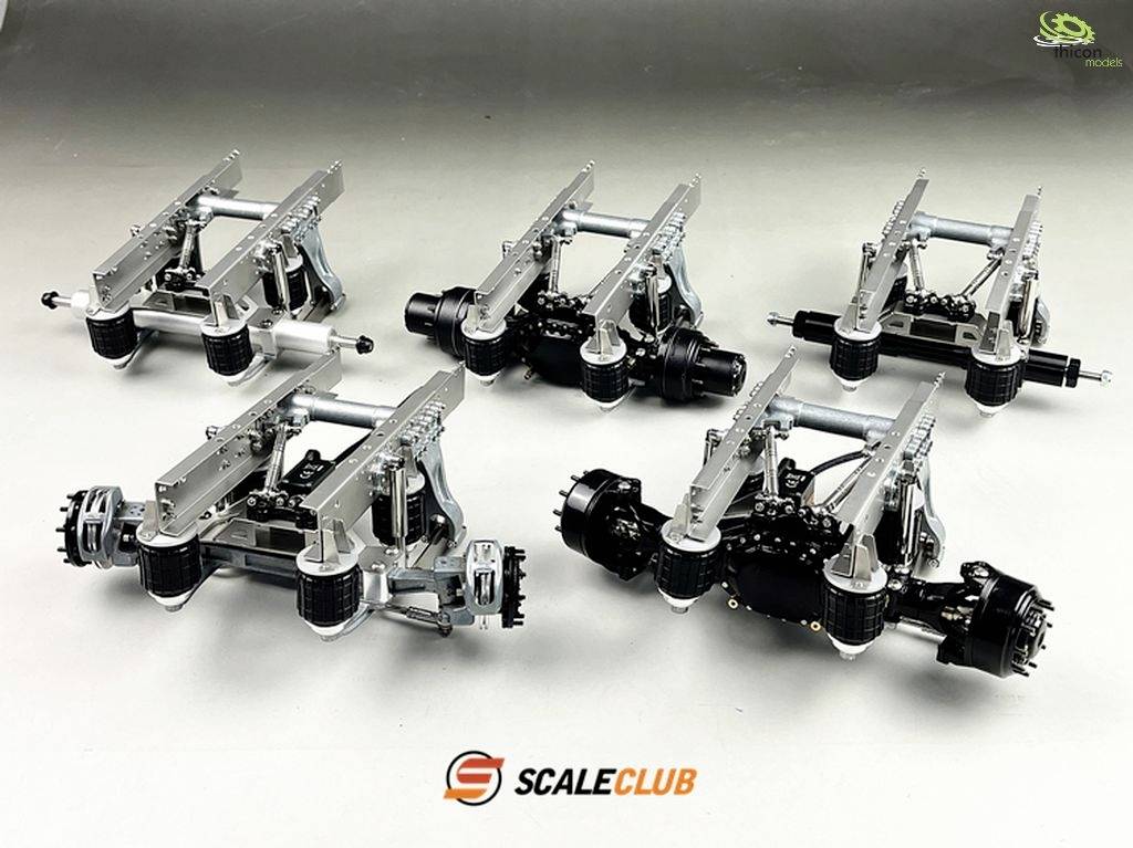 'ScaleClub' model vehicle axles in various variants on a grey background, suitable for model-making and hobby projects.