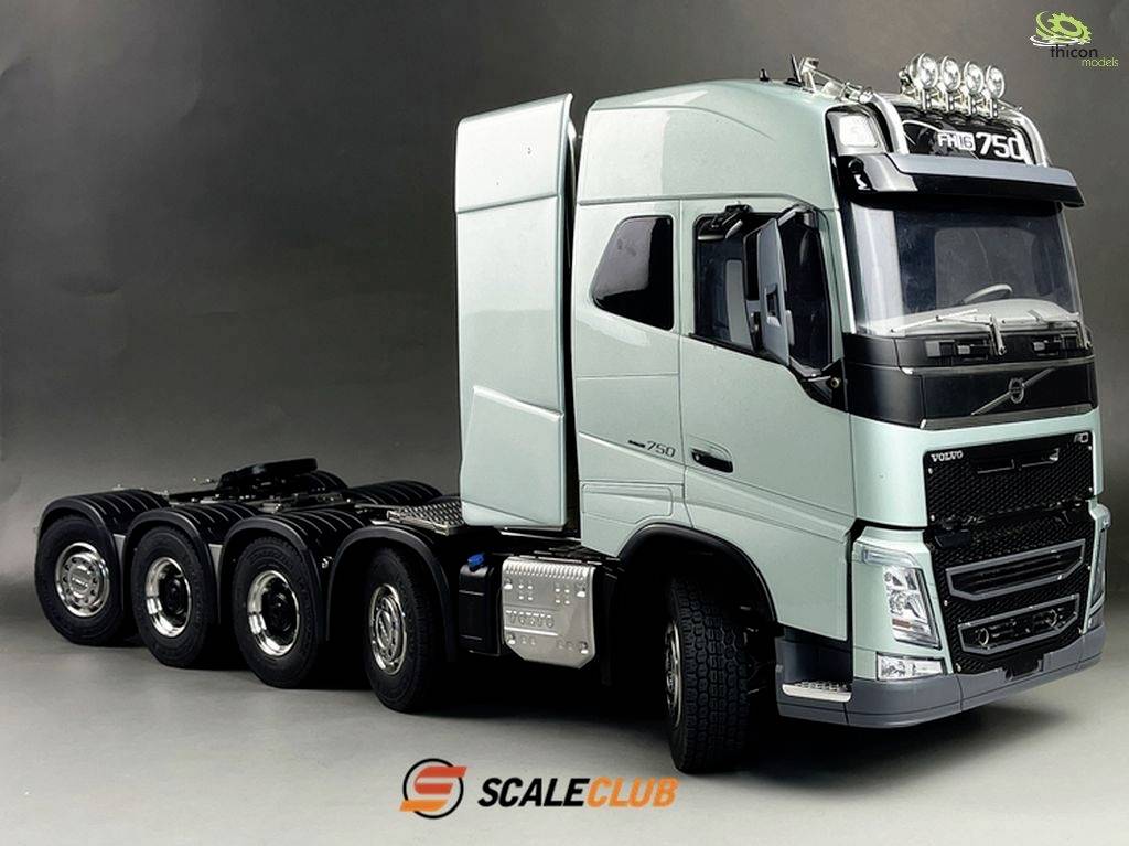 Green lorry without a trailer with six wheels, side profile. 'FH16 750' written on top. 'ScaleClub' brand logo at the bottom.