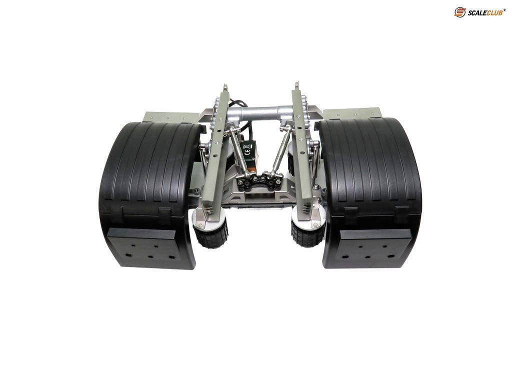 A model lorry axle module with four large tyres and a mechanical lifting system, developed for RC vehicles.
