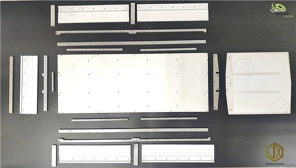 Various metal parts are arranged in rows on a table. The 'Green Vision' logo is located in the top left, and the '3Xmodel' logo is in the bottom right.