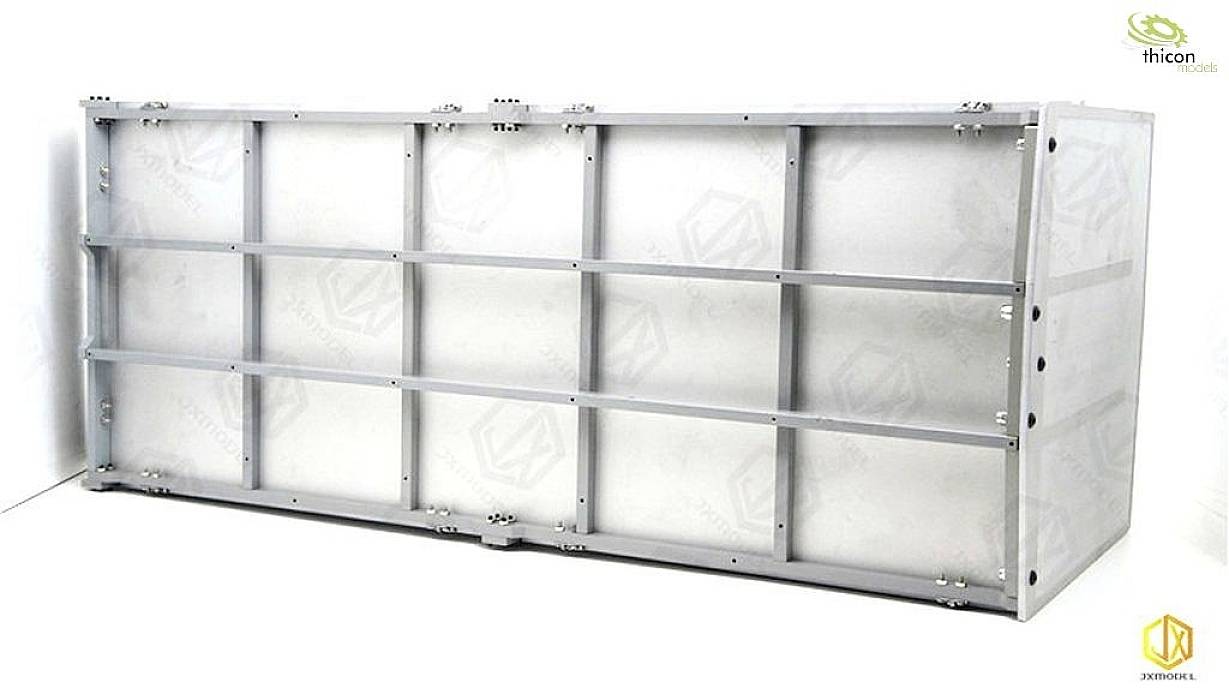 A silver, rectangular water tank in a white room; logo in the top right corner of the image.