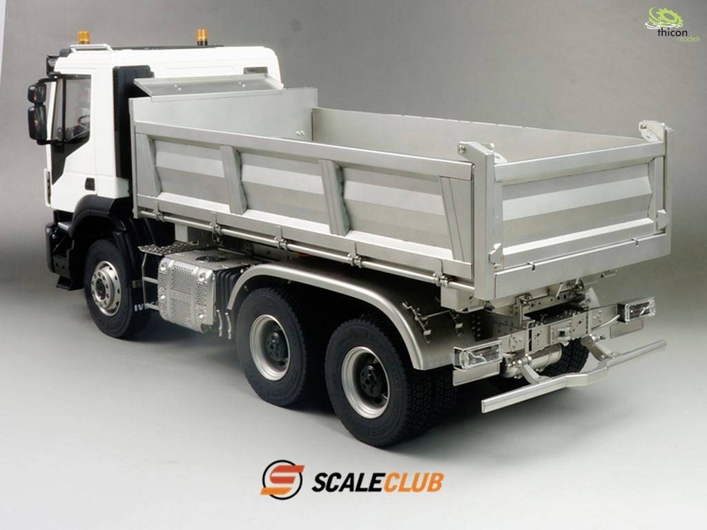 A model of a white tipper truck on a grey background. Distinct details visible on the loading area and wheels.