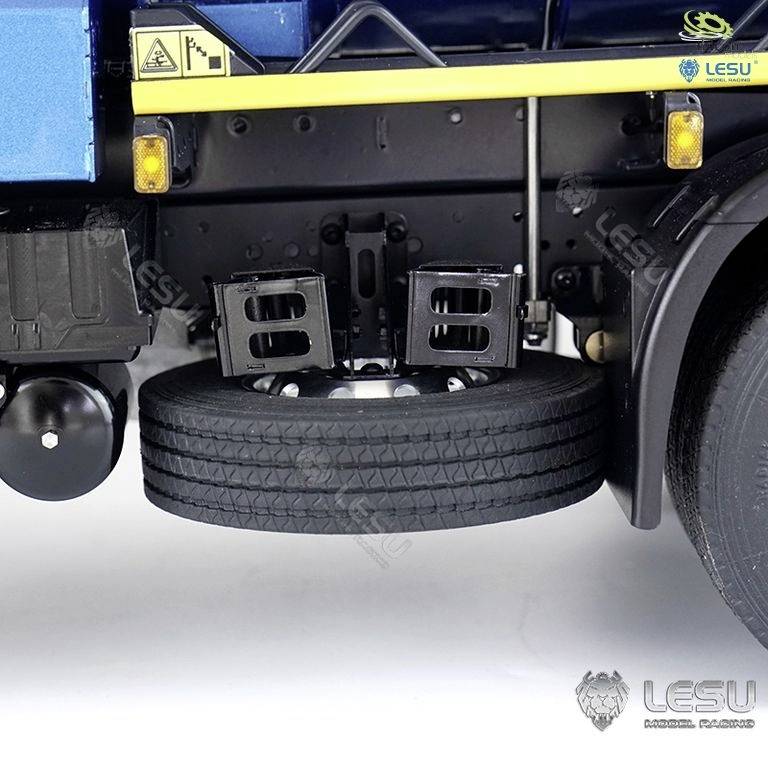 Part of a model truck, showing the rear with a spare tyre and yellow line along the edge. Lesu logo on the truck.